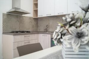 Réfrigérateur, four, plaque de cuisson, cafetiÚre/bouilloire