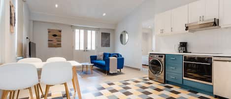 Deluxe Apartment | Living area | 55-inch Smart TV with digital channels, TV