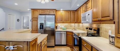 Microwave, stovetop, dishwasher, coffee/tea maker