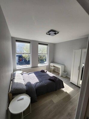 Apartemen, Beberapa Tempat Tidur | 2 kamar tidur, setrika/meja setrika, Wi-Fi gratis, dan seprai linen