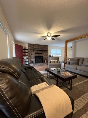 Smart TV, fireplace, books