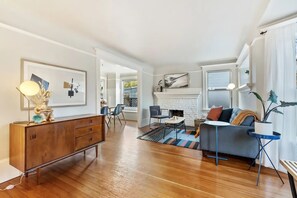 Smart TV, fireplace, books, video library