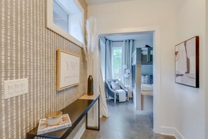 4 bedrooms, desk, iron/ironing board, travel cot
