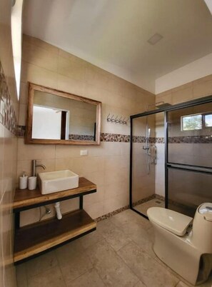 Shower, towels, soap, toilet paper