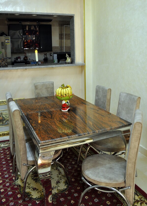 Comfort Apartment, 3 Bedrooms, Garden View | Living area | LCD TV