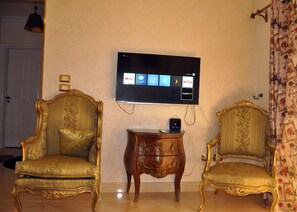 Comfort Apartment, 3 Bedrooms, Garden View | Living area | LCD TV