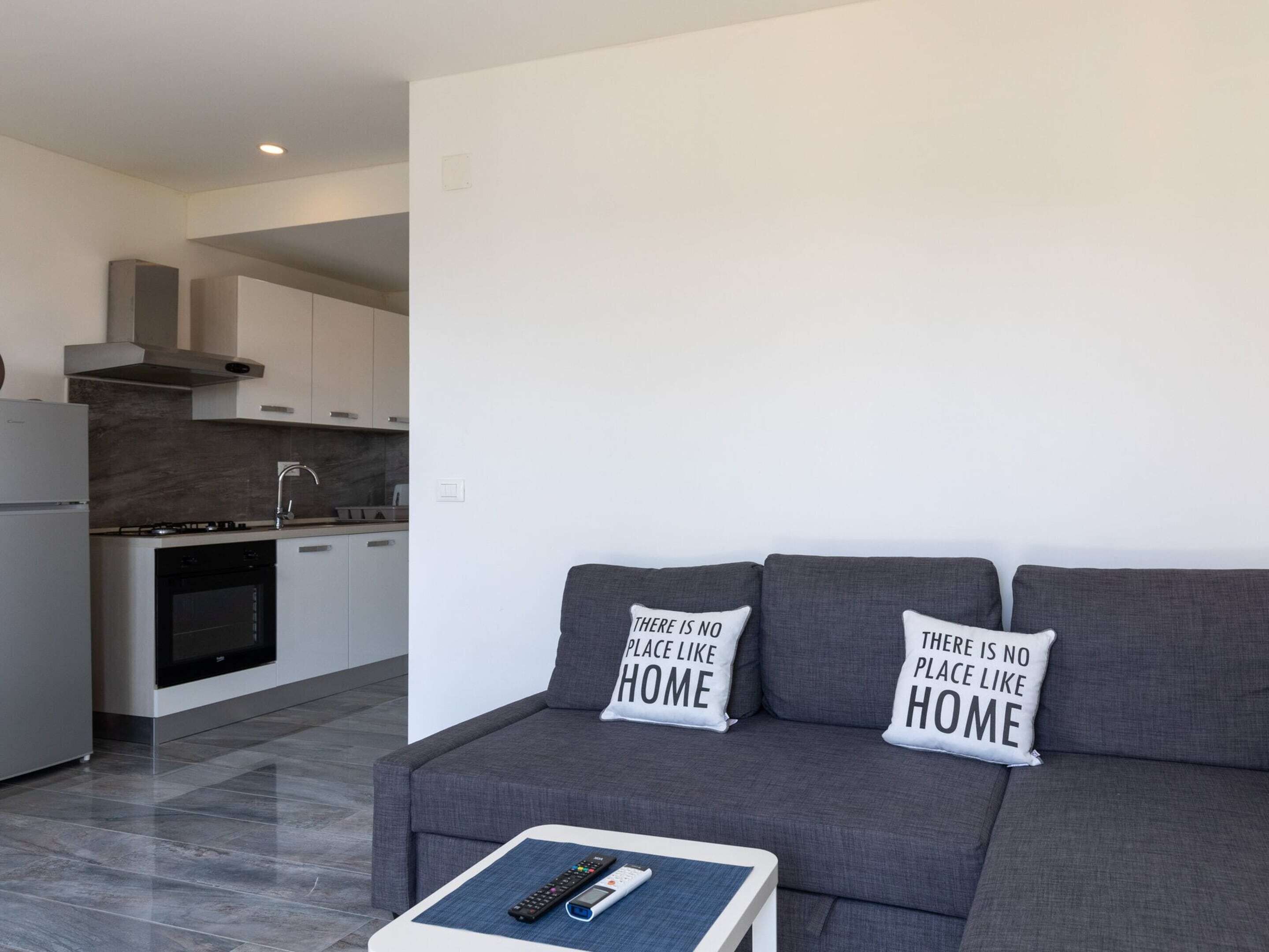 Appartement | Privékeuken | Een koelkast, een microgolfoven, een oven, een kookplaat