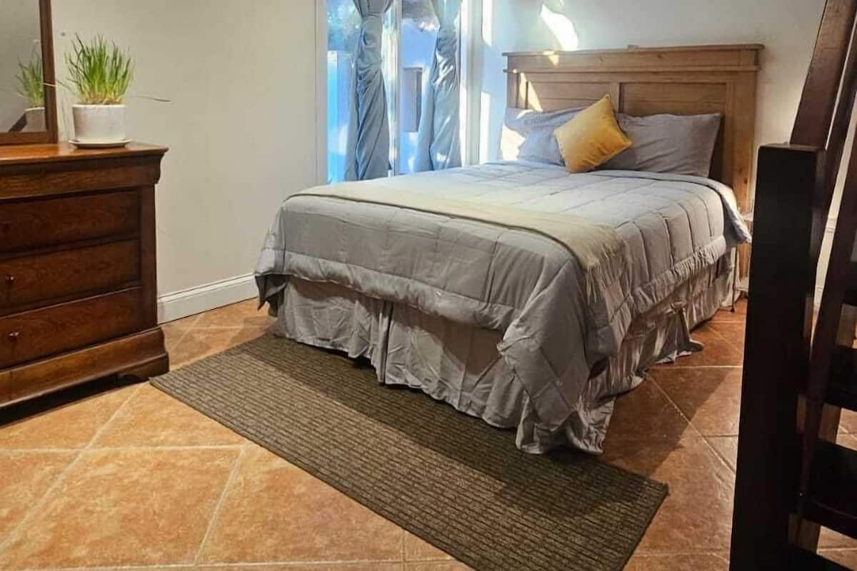 Family Room | 1 bedroom, iron/ironing board, free WiFi, bed sheets