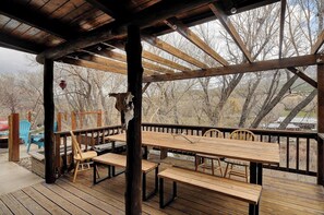 Outdoor dining - Our sunny, solar-powered home is located on the biking path that leads to Salida’s quaint downtown. The house has a rural feel and fantastic panoramic views, but is just 1.5 miles from all the restaurants, galleries, shops, and parks of Salida. (Salida)
