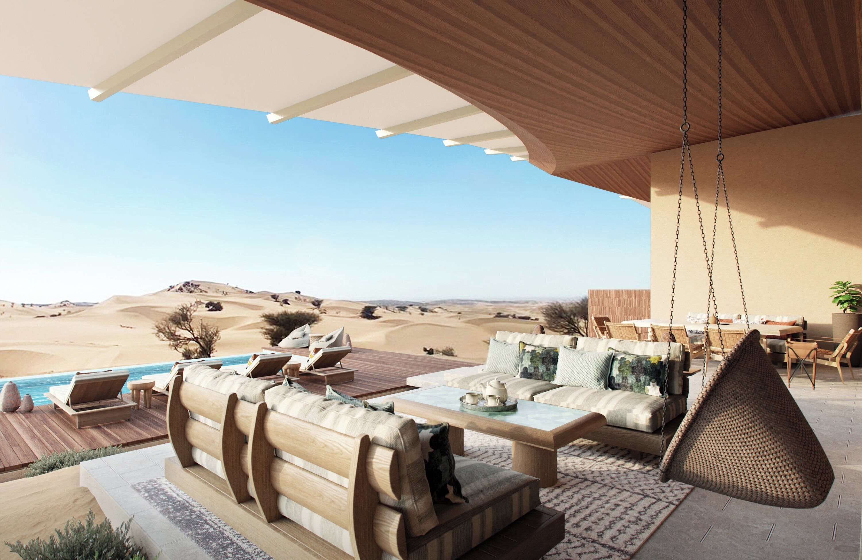 A modern outdoor lounge area with a pool, wooden furniture, and a view of the desert.