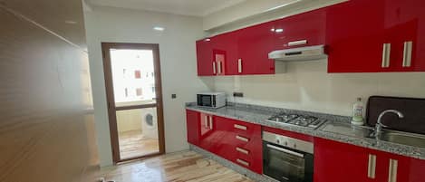 Fridge, microwave, oven, cookware/dishes/utensils
