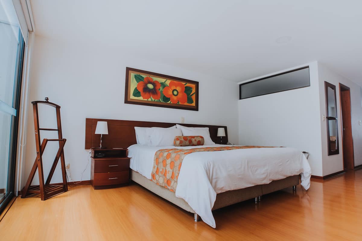 Habitación Elite doble de uso individual | Ropa de cama de alta calidad y edredones de plumas