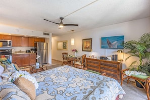 1 habitación, tabla de planchar con plancha y cuna de viaje 
