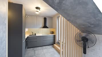 Exclusive Apartment (1) | Private kitchen | Stovetop, dishwasher, electric kettle, high chair