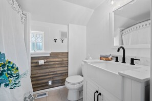 Eco-friendly toiletries, hair dryer, towels, soap