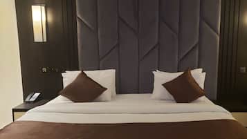 Kamar Single Deluks, 1 Tempat Tidur Queen | 1 kamar tidur, meja kerja, ruang kerja ramah laptop, dan Wi-Fi gratis