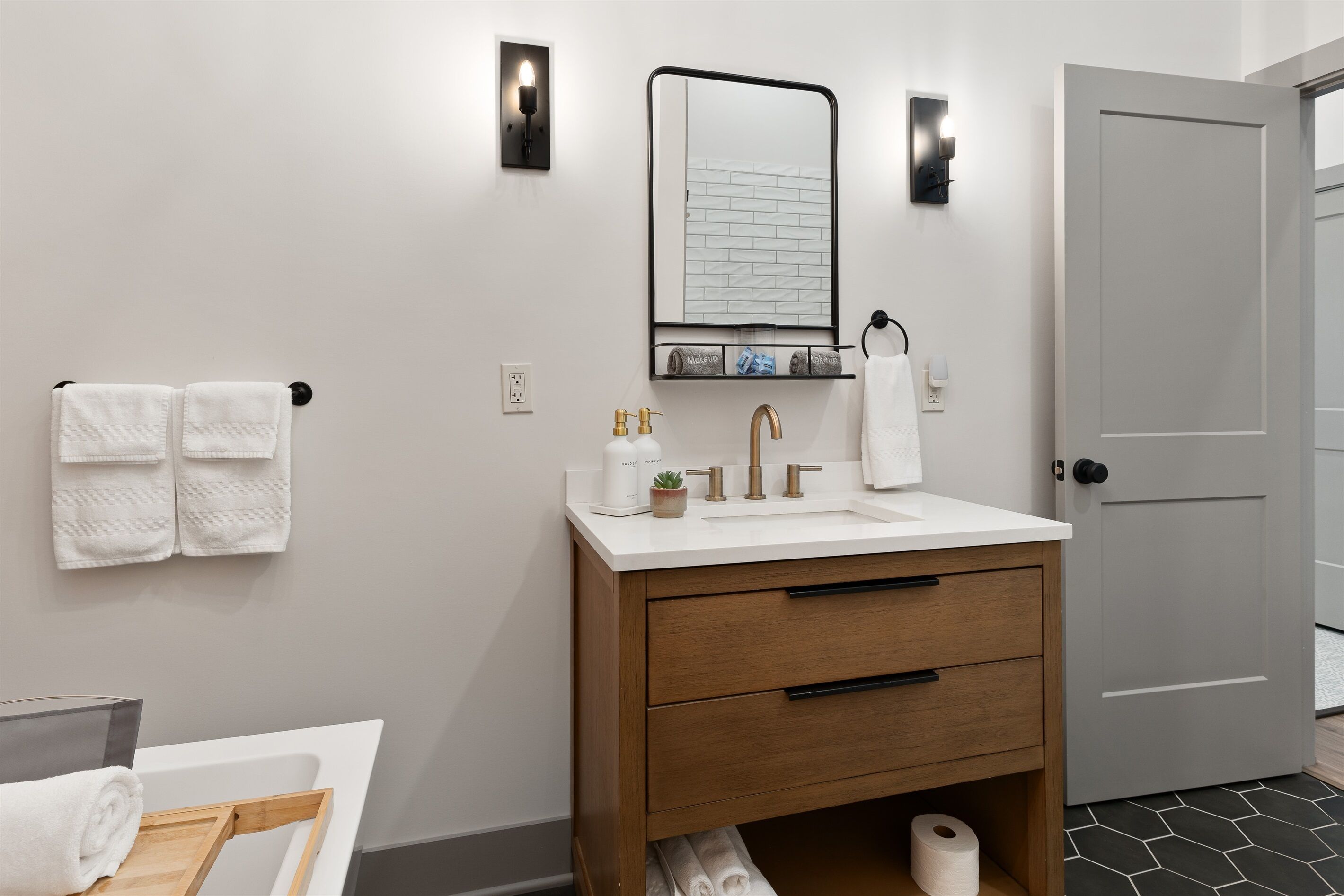 Bathtub, hair dryer, towels