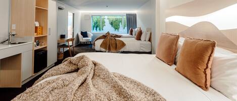 Habitación familiar | Sábanas de algodón egipcio y ropa de cama de alta calidad