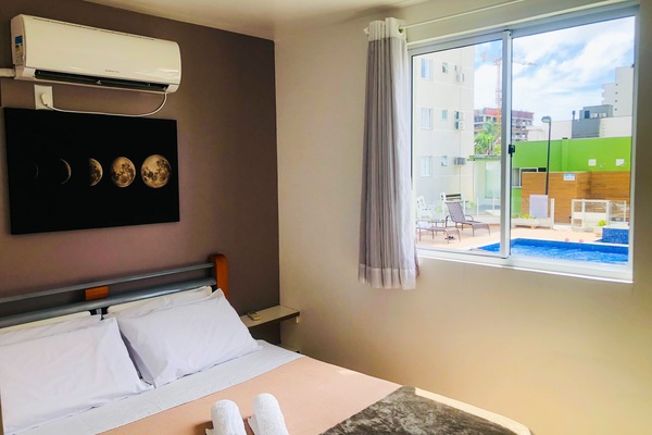 Family Apartment, 2 Bedrooms, Pool View, Beachside | Desk, laptop workspace, free WiFi