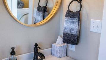 Hair dryer, towels, soap, shampoo