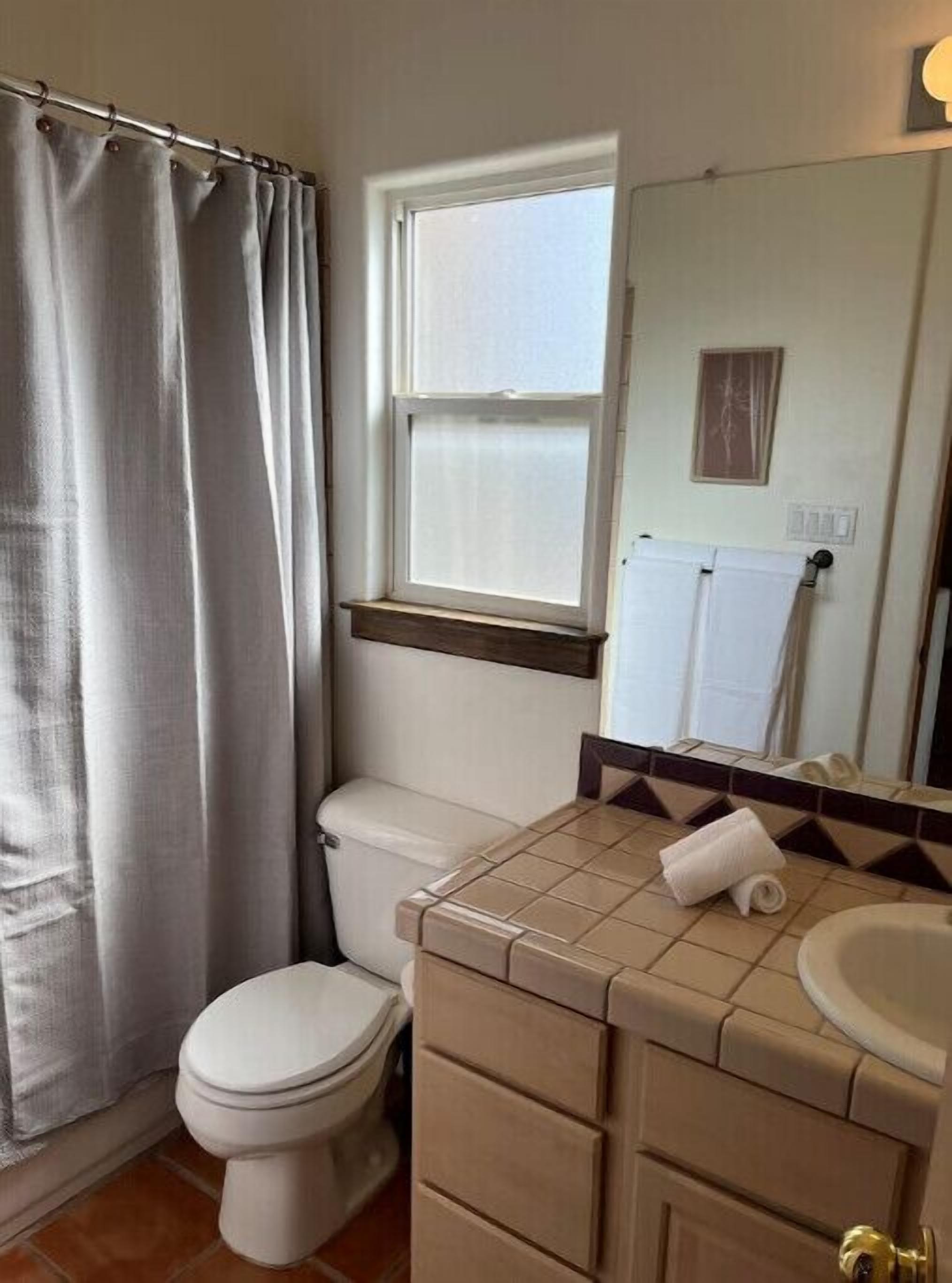 Cheerful 3 bedroom home with fireplace.