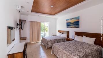 Classic Double Room, 2 Double Beds, Non Smoking, Partial Ocean View | 1 bedroom, free WiFi, bed sheets