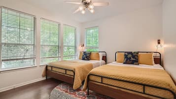 3 bedrooms, desk, iron/ironing board, travel cot