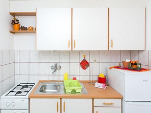 Departamento | Cocina privada | Refrigerador, horno, parrilla de estufa y tostadora 