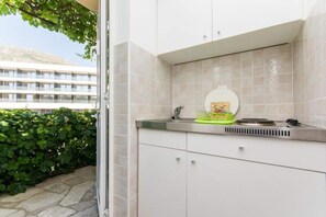 Appartement | Cuisine privée | Réfrigérateur, plaque de cuisson, bouilloire électrique
