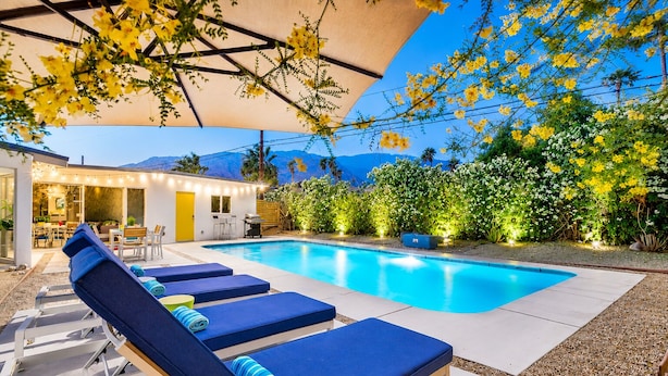 A swimming pool with lounge chairs, a covered patio, and a view of mountains. - 25% Off Sept 10-12 Great 4 Families -Pool, Jacuzzi (Palm Springs)