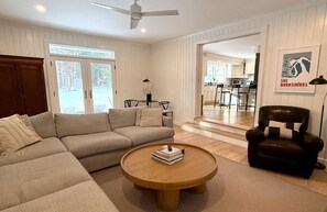 Smart TV, fireplace, video game console, books