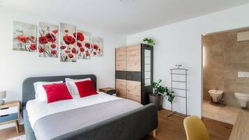 1 dormitorio, tabla de planchar con plancha, wifi gratis y ropa de cama