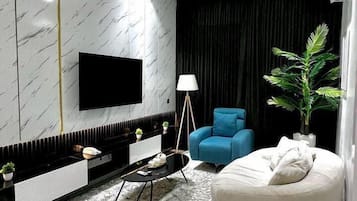 Classic Apartment | Living area | 75-inch Smart TV with digital channels, Netflix, streaming services