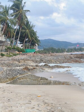 Na praia, toalhas de praia 