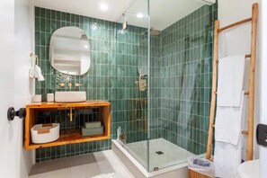 Shower, hair dryer, towels, soap