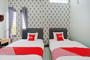 Chambre Double Deluxe | Draps fournis