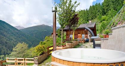 Chalet with Sauna & Hot Tub, Mountain View, Private Terrace & Wi-Fi