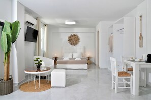 Deluxe-studio, näköala puutarhaan | Oleskelualue | 40–tuumainen äly-TV, jossa satelliittikanavat