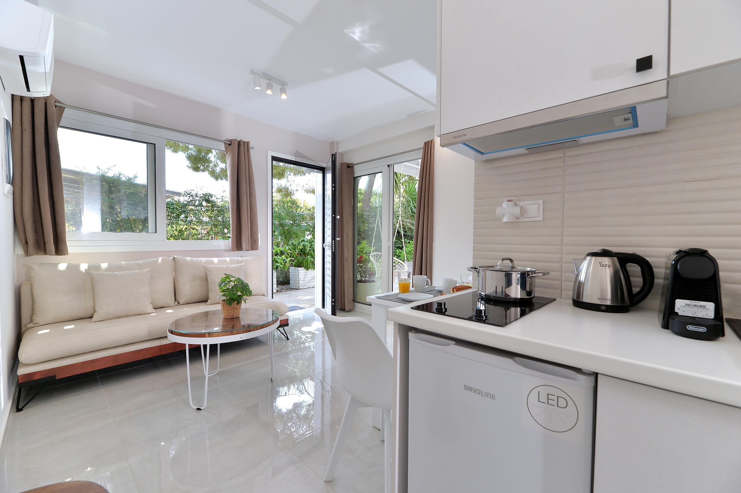 Duplex, Garden View (Split Level) | Private kitchen | Mini-fridge, espresso maker, coffee/tea maker, electric kettle