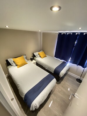 1 dormitorio, tabla de planchar con plancha, wifi gratis y ropa de cama