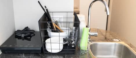 Fridge, microwave, stovetop, cookware/dishes/utensils