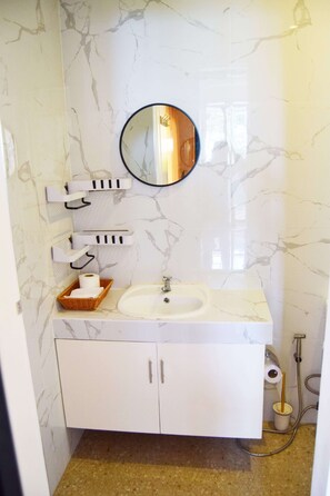 Romantic Apartment | Bathroom | Jetted tub, hydromassage showerhead, free toiletries, hair dryer