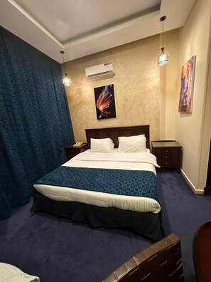 Chambre Double Deluxe | Minibar, coffres-forts dans les chambres, Wi-Fi gratuit, draps fournis