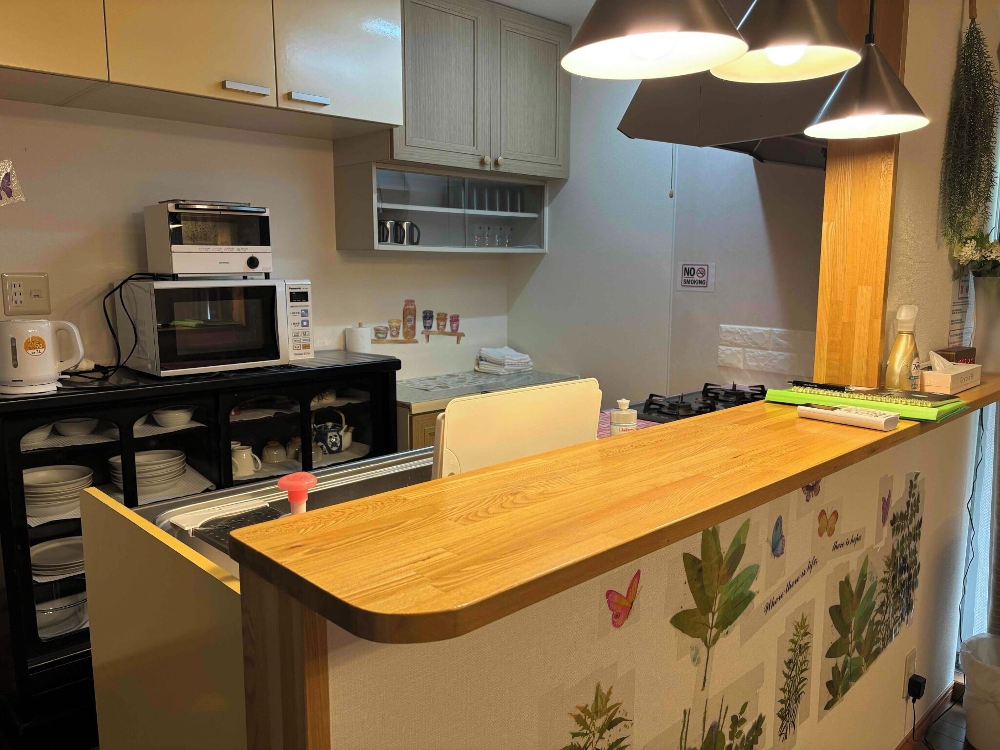 Fridge, microwave, stovetop, cookware/dishes/utensils