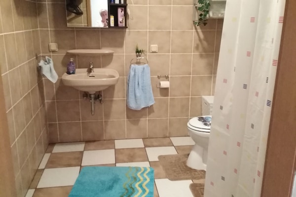 Shower, towels, soap, shampoo