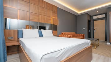 Premium bedding, minibar, desk, laptop workspace