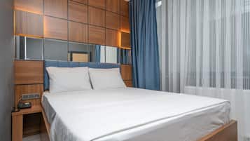 Premium bedding, minibar, desk, laptop workspace