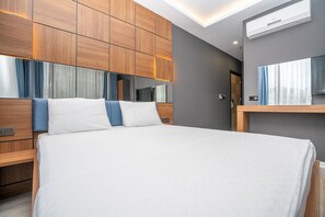 Premium bedding, minibar, desk, laptop workspace
