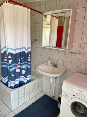 Een douche, een haardroger, zeep