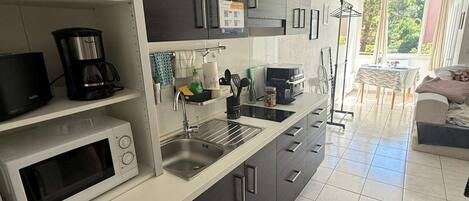 Fridge, microwave, coffee/tea maker, toaster